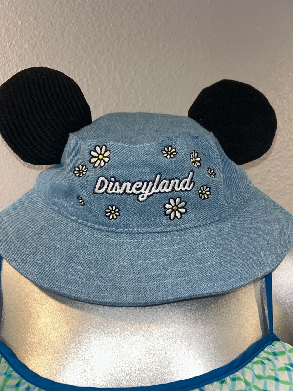 NWOT Disneyland Light Blue Daisy Embroidered Bucket Hat with Black Ears